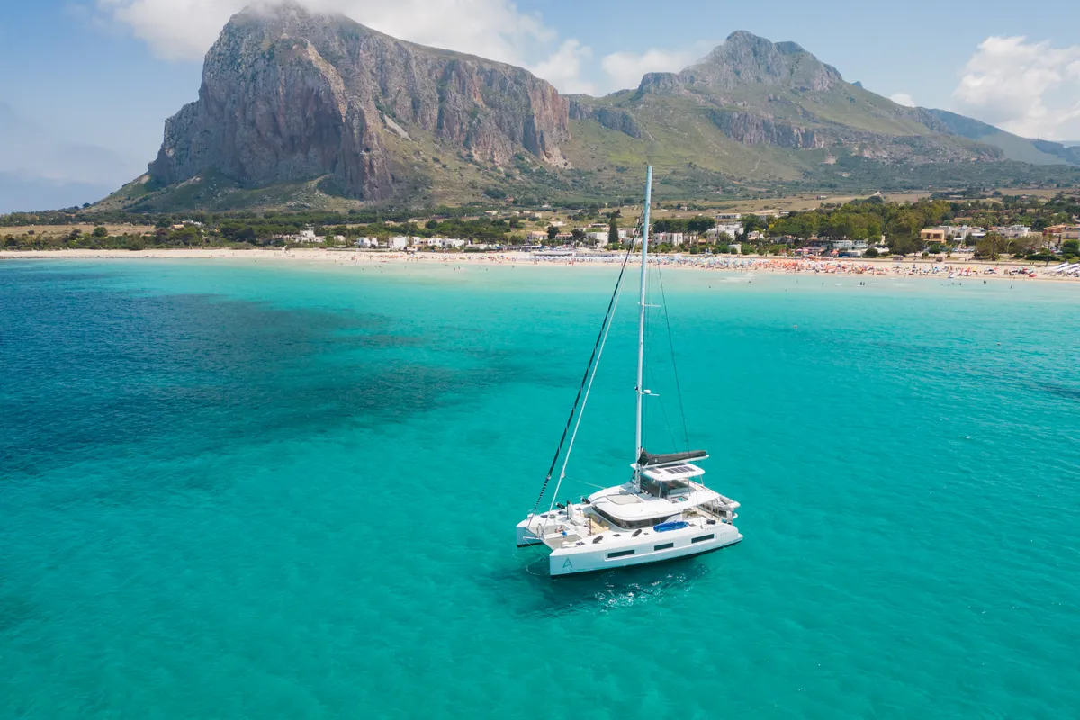 Exterior view of CARA, a Lagoon 55 catamaran at Capo d'Orlando, Italy