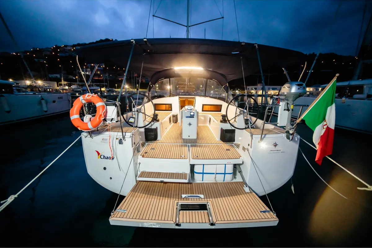 Deck of Chaos - Standard line, a Jeanneau Sun Odyssey 490 sailboat at Capo d'Orlando, Italy
