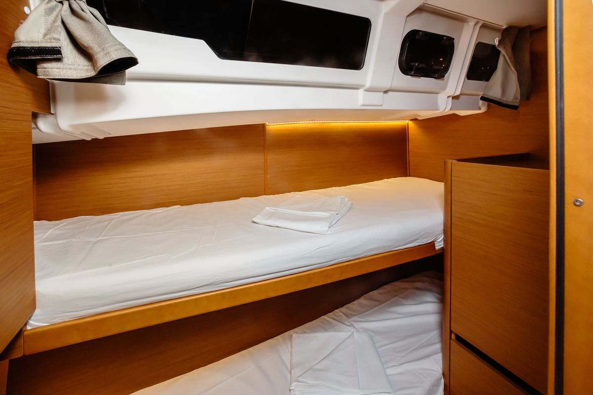 Cabin on Chaos - Standard line, a Jeanneau Sun Odyssey 490 sailboat at Capo d'Orlando, Italy