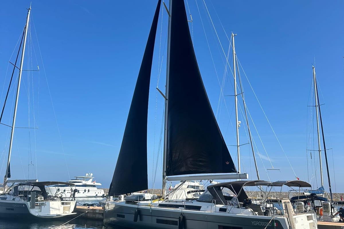 Exterior view of Rhamnus, a Dufour 530 sailboat at Olbia, Italy