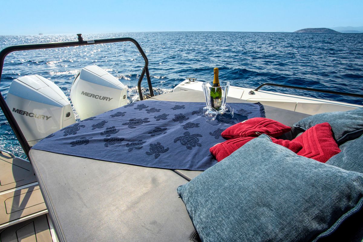 Deck of ENIGMA, a Axopar 37 Sun Top motorboat at Parikia, Greece
