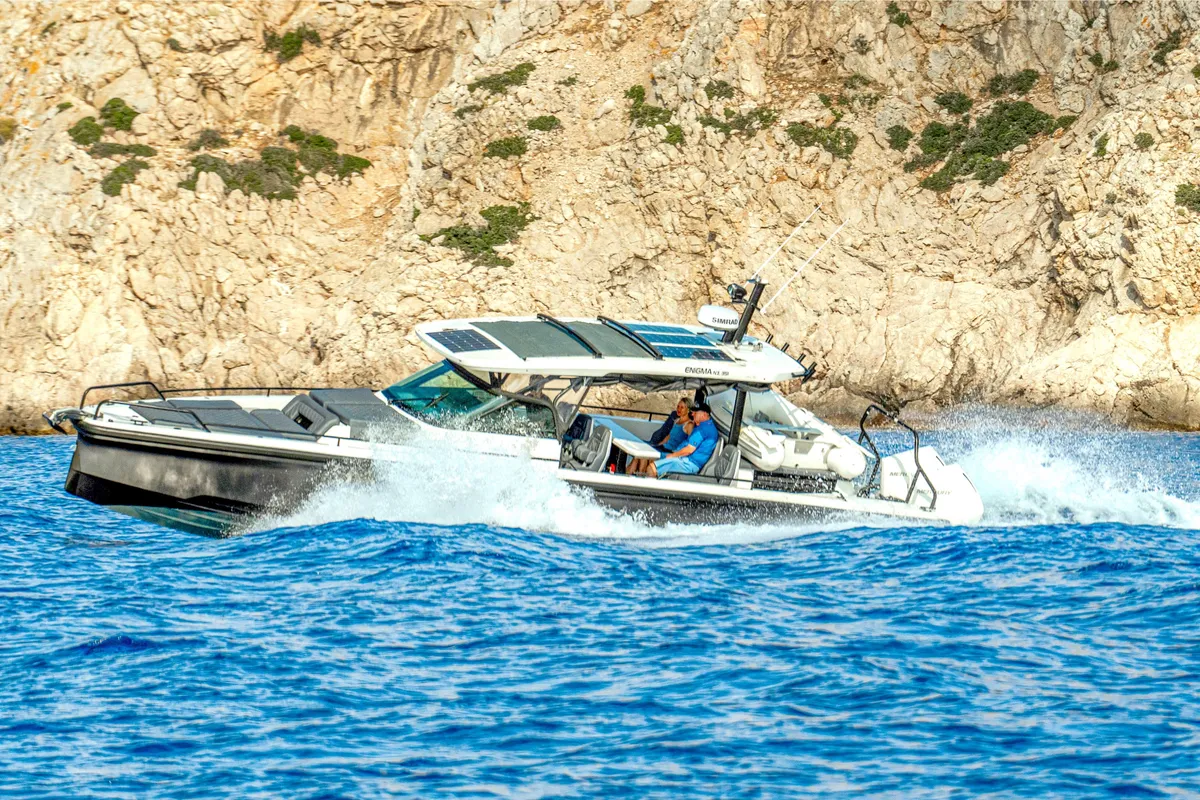 Exterior view of ENIGMA, a Axopar 37  Sun Top motorboat at Parikia, Greece