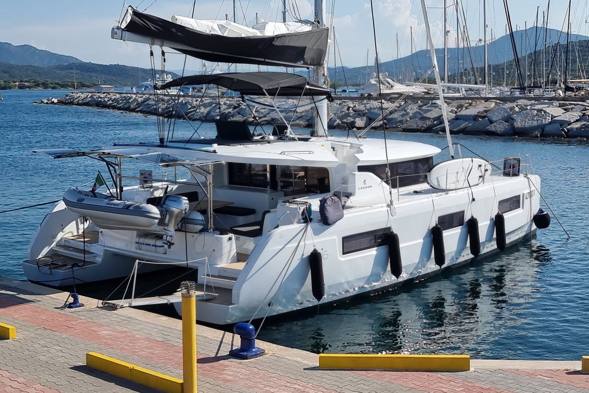 Exterior view of Altair, a Lagoon 46 catamaran at Olbia, Italy