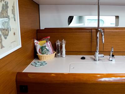 Galley of FILIPPOS I  Boat location in LEFKAS MARINA, D-marin  1 SUP FREE, a Jeanneau Sun Odyssey 479 sailboat at Municipal…