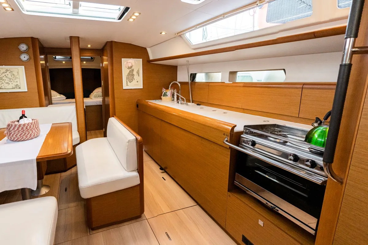 Galley of FILIPPOS I  Boat location in LEFKAS MARINA, D-marin  1 SUP FREE, a Jeanneau Sun Odyssey 479 sailboat at Municipal…
