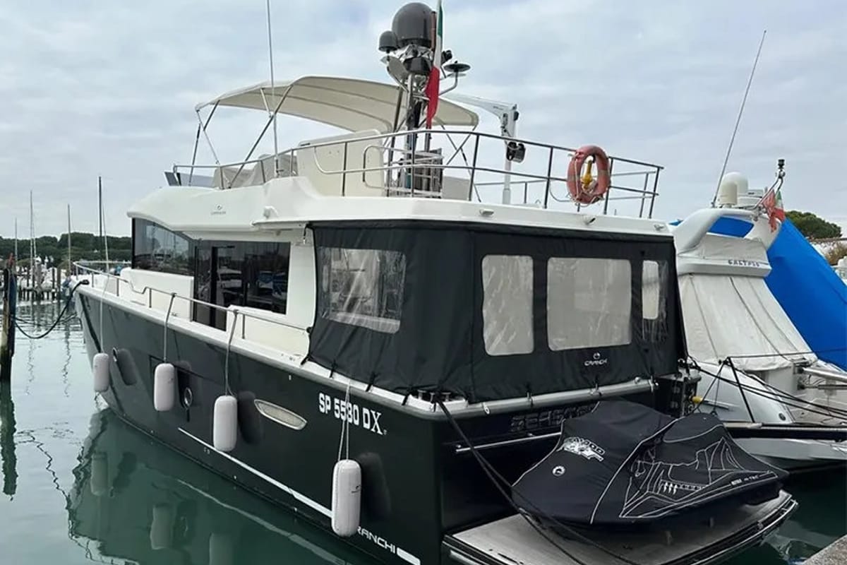 Exterior view of Sea Star V, a Cranchi Eco Trawler 53 LD motorboat at Cannigione, Italy