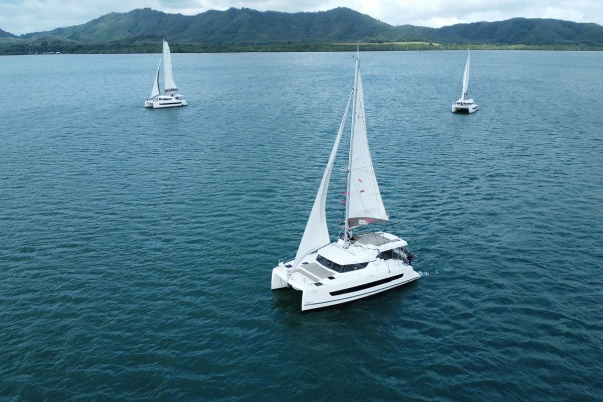 Exterior view of Joyous, a Bali 4.2 catamaran at Mai Khao, Thailand