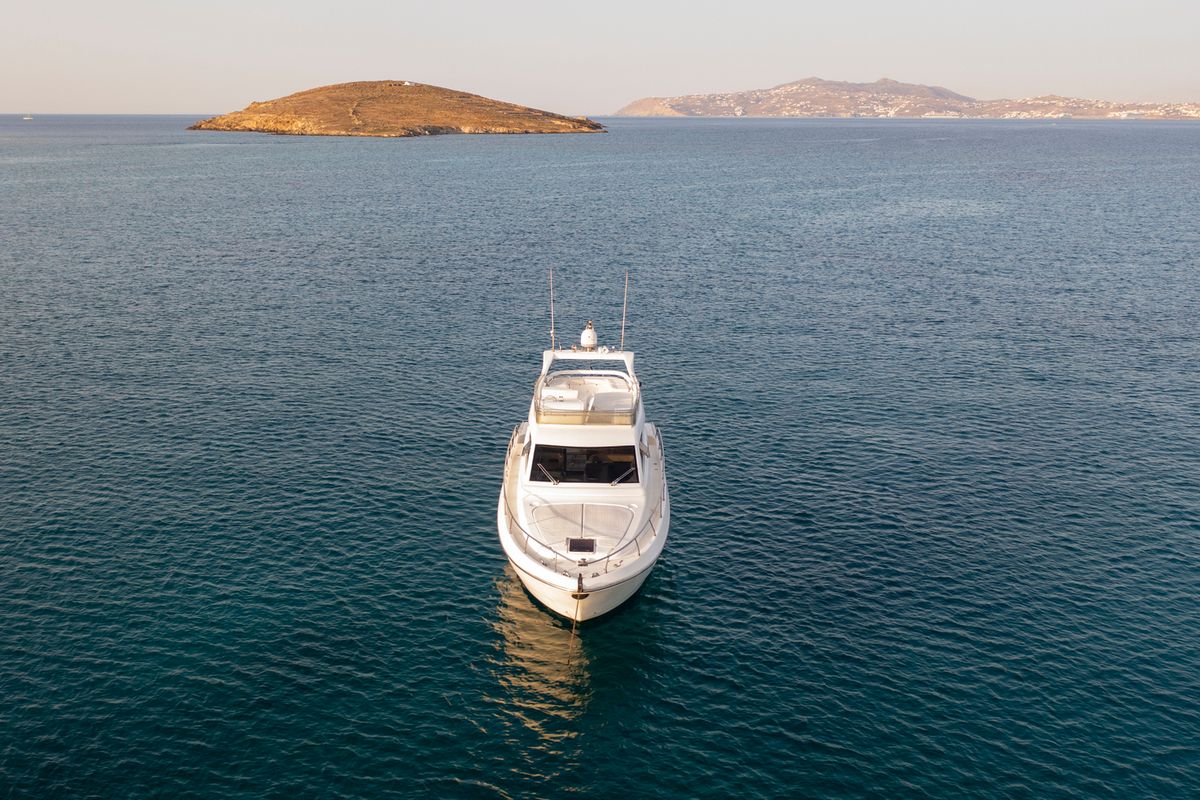 Exterior view of Arabella, a Ferretti 480 motorboat at Parikia, Greece