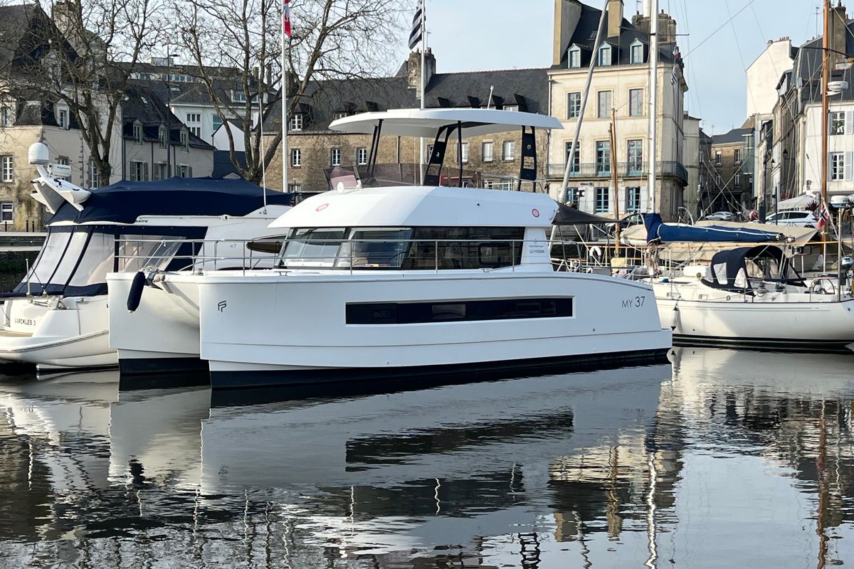Exterior view of ROSSINANTE, a Fountaine Pajot MY37 catamaran at Cogolin, France