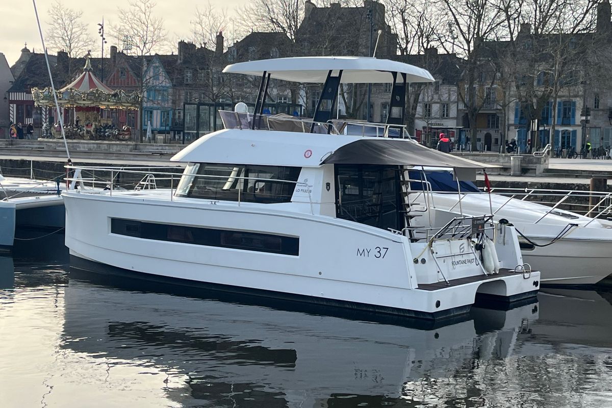 Exterior view of ROSSINANTE, a Fountaine Pajot MY37 catamaran at Cogolin, France