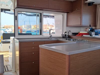 Galley of Harael, a Lagoon 450 Fly catamaran at Figari/Golfo Aranci, Italy