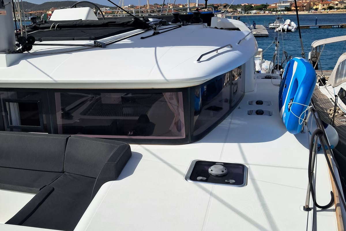 Exterior view of Harael, a Lagoon 450 Fly catamaran at Figari/Golfo Aranci, Italy
