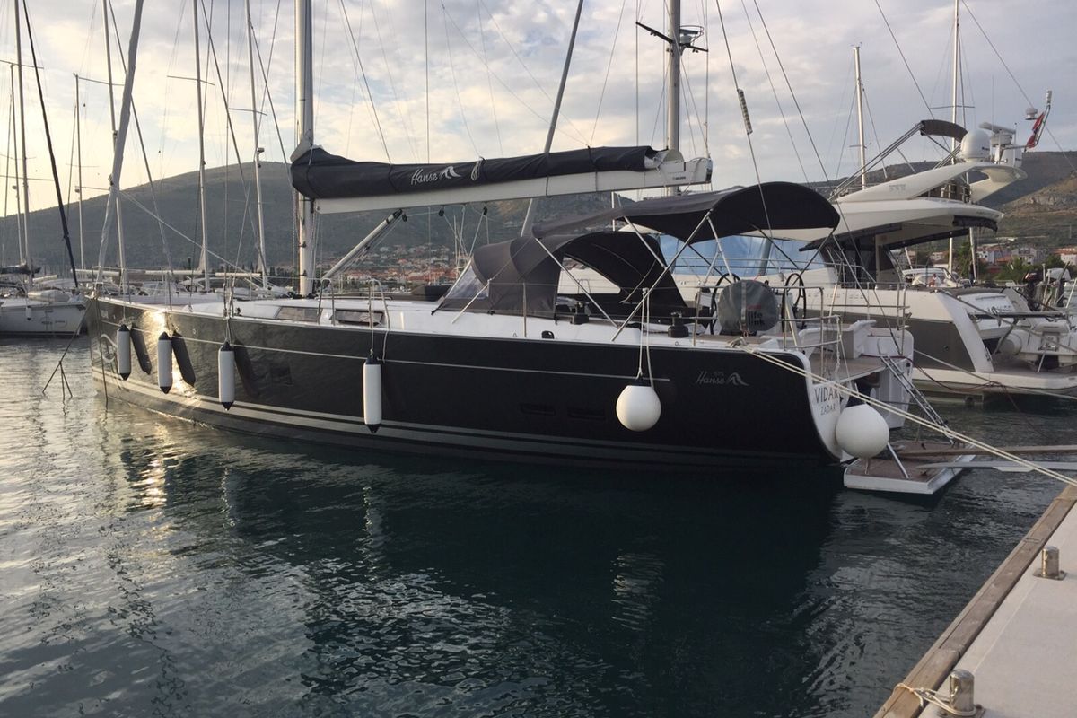 Exterior view of Vidar, a Hanse Yachts Hanse 575 sailboat at Grad Trogir, Croatia