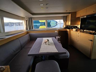 Salon of Corona Borealis, a Lagoon 450 Fly catamaran at Nettuno, Italy