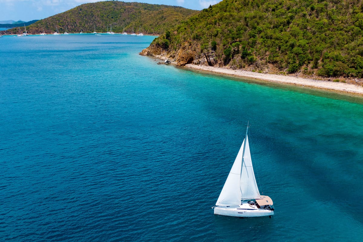 Exterior view of Off The Clock , a Jeanneau Sun Odyssey 349 sailboat at Road Town, British Virgin Islands