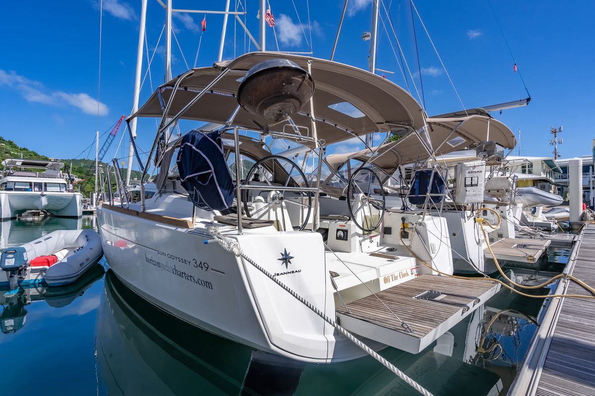 Exterior view of Off The Clock , a Jeanneau Sun Odyssey 349 sailboat at Road Town, British Virgin Islands