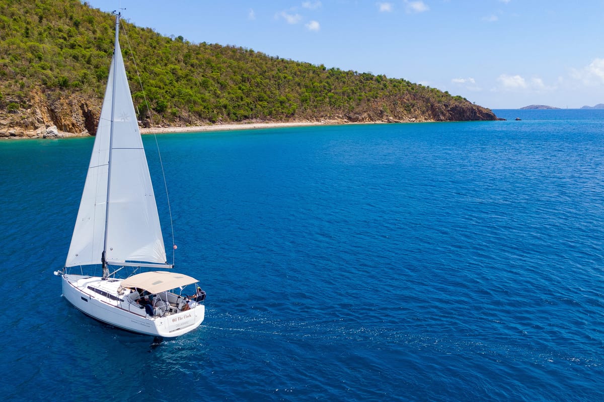 Exterior view of Off The Clock , a Jeanneau Sun Odyssey 349 sailboat at Road Town, British Virgin Islands