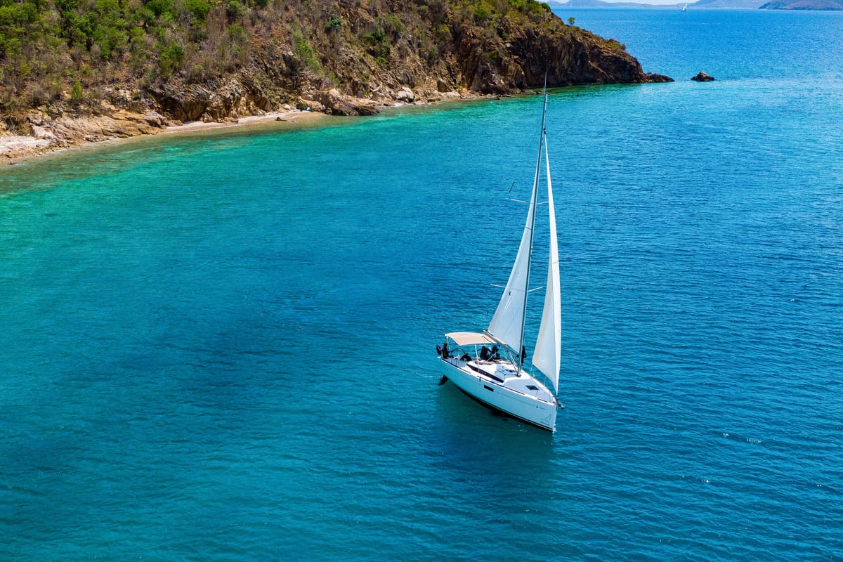 Exterior view of Off The Clock , a Jeanneau Sun Odyssey 349 sailboat at Road Town, British Virgin Islands