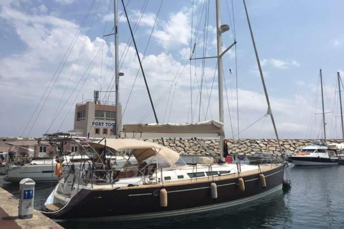 Exterior view of Rubra, a Jeanneau Sun Odyssey 49 sailboat at Toulon, France