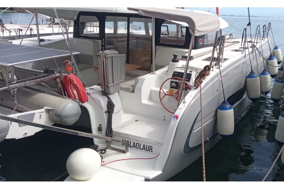 Exterior view of MALAOLAUR, a Excess 11 catamaran at Kontokali, Greece