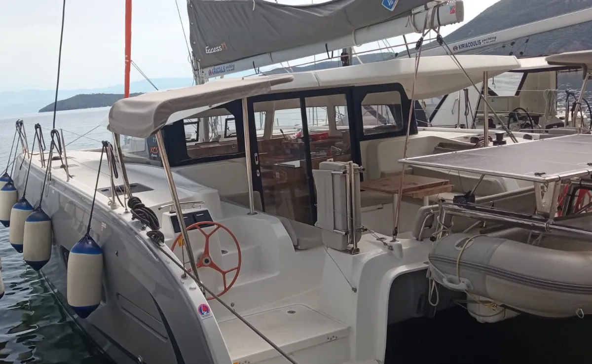 Exterior view of MALAOLAUR, a Excess 11 catamaran at Kontokali, Greece