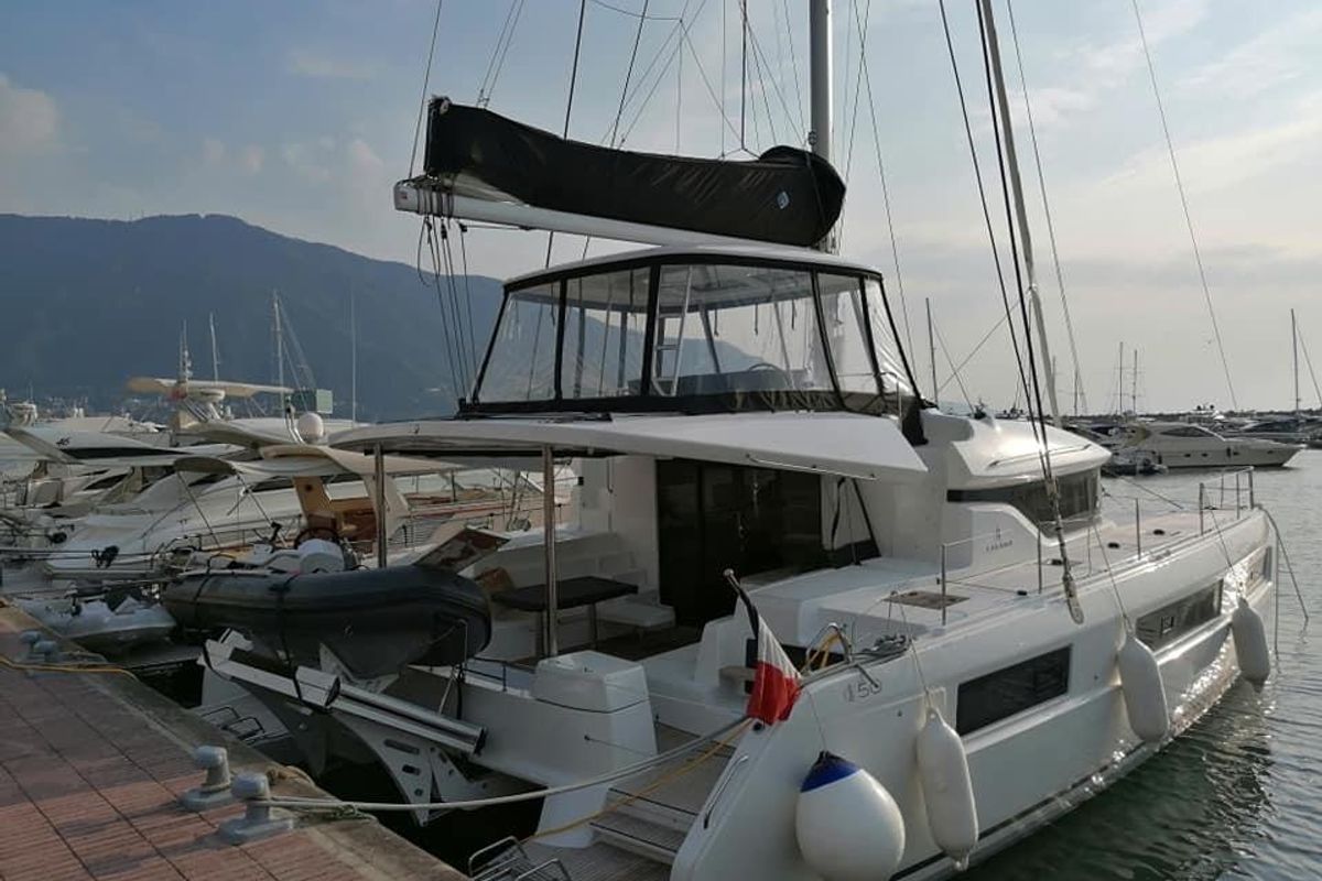 Exterior view of Colibrì Platinum Service, a Lagoon 50 catamaran at Castellammare di Stabia, Italy