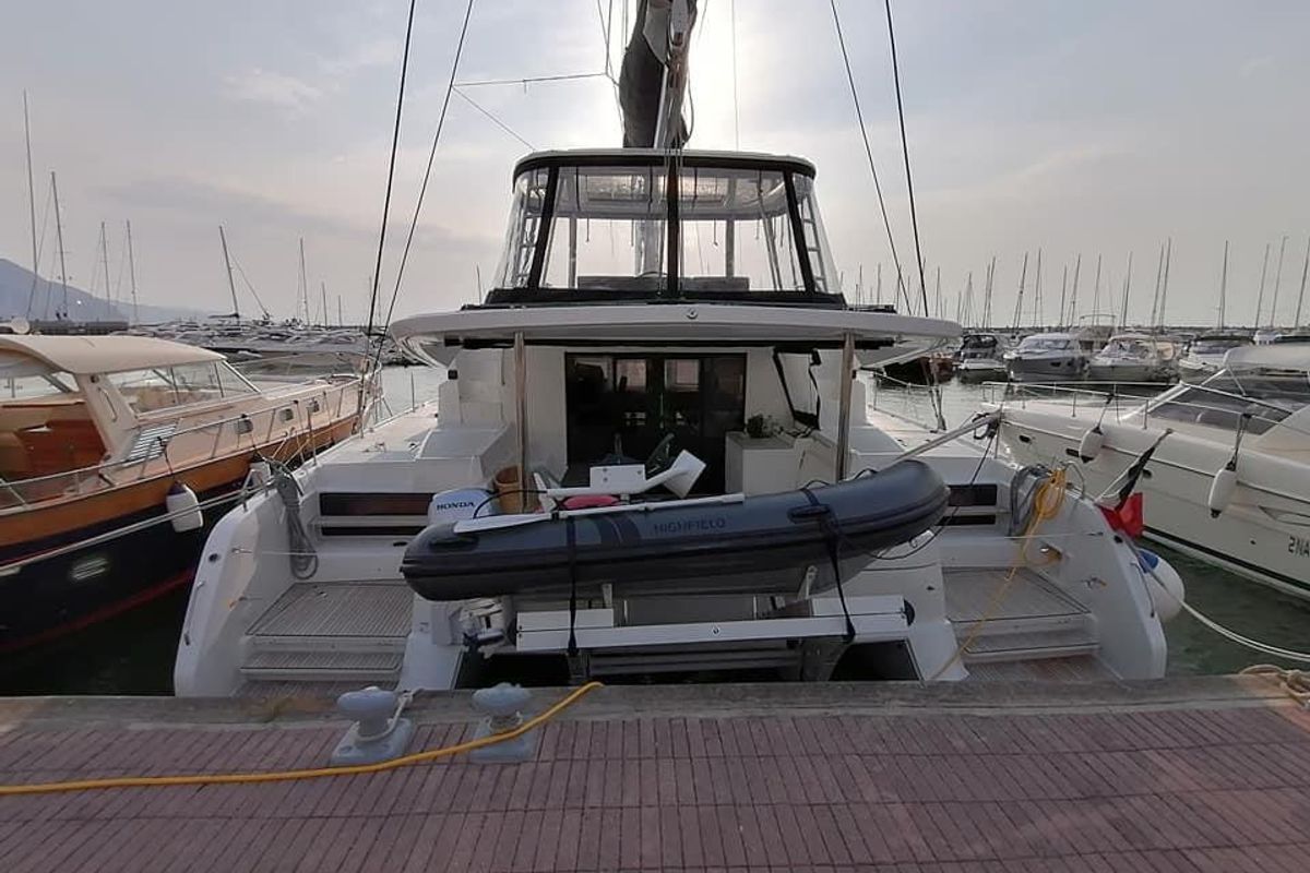 Exterior view of Colibrì Platinum Service, a Lagoon 50 catamaran at Castellammare di Stabia, Italy
