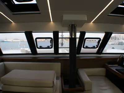 Salon of Sardinia II, a Nautitech 46 Fly catamaran at Figari/Golfo Aranci, Italy