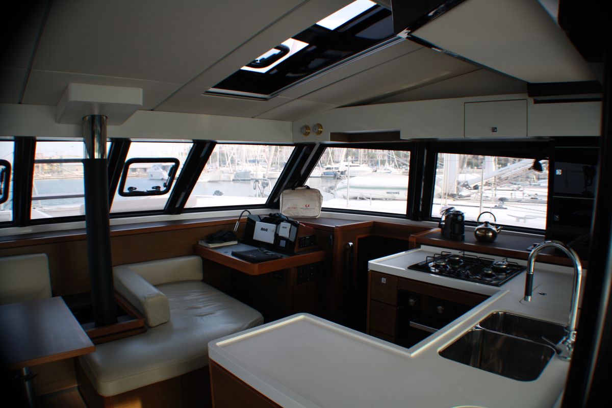 Salon of Sardinia II, a Nautitech 46 Fly catamaran at Figari/Golfo Aranci, Italy