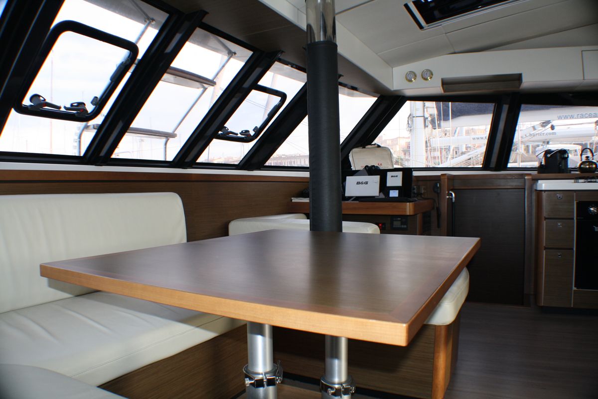 Salon of Sardinia II, a Nautitech 46 Fly catamaran at Figari/Golfo Aranci, Italy
