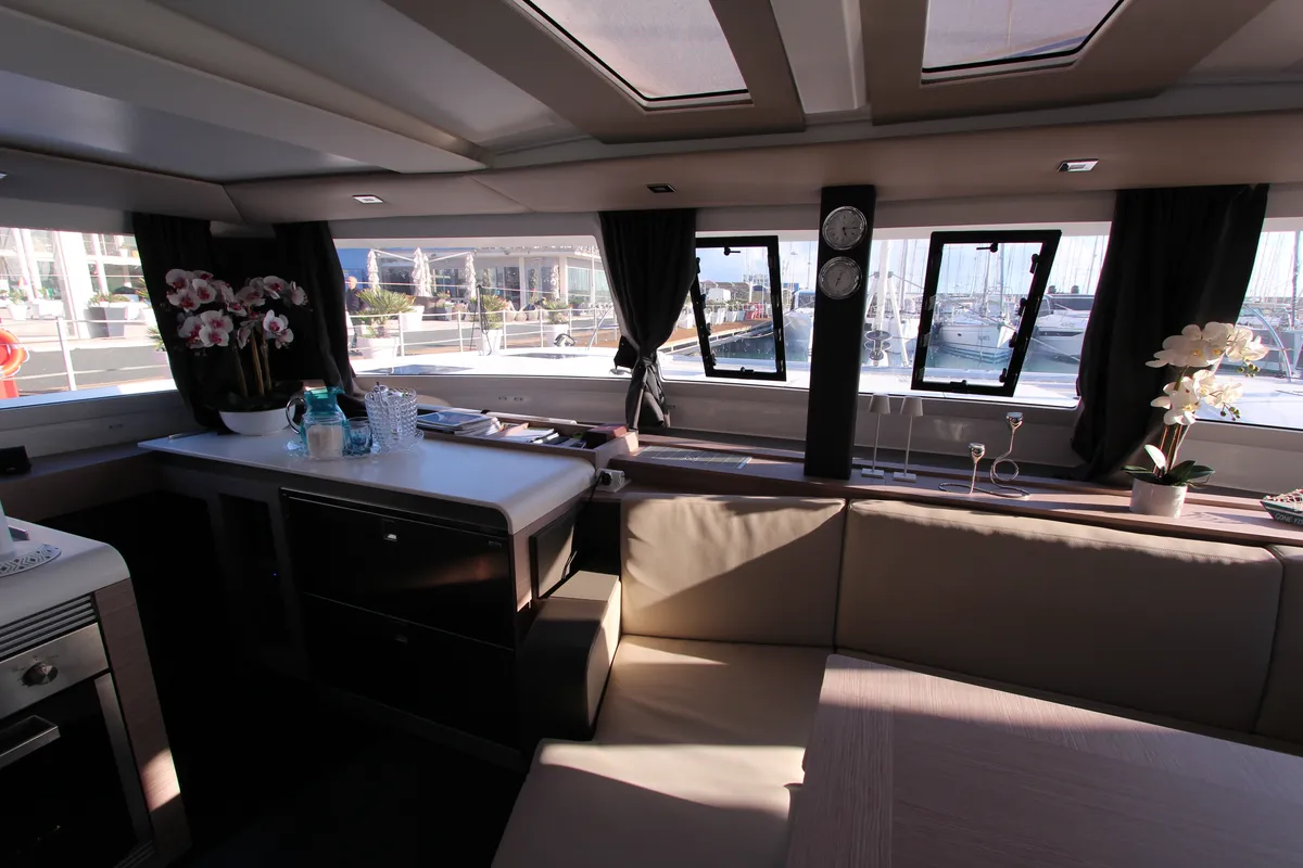 Salon of Sonrisa, a Fountaine Pajot Tanna 47 Maestro catamaran at Olbia, Italy