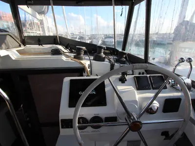 Cockpit of Sonrisa, a Fountaine Pajot Tanna 47 Maestro catamaran at Olbia, Italy