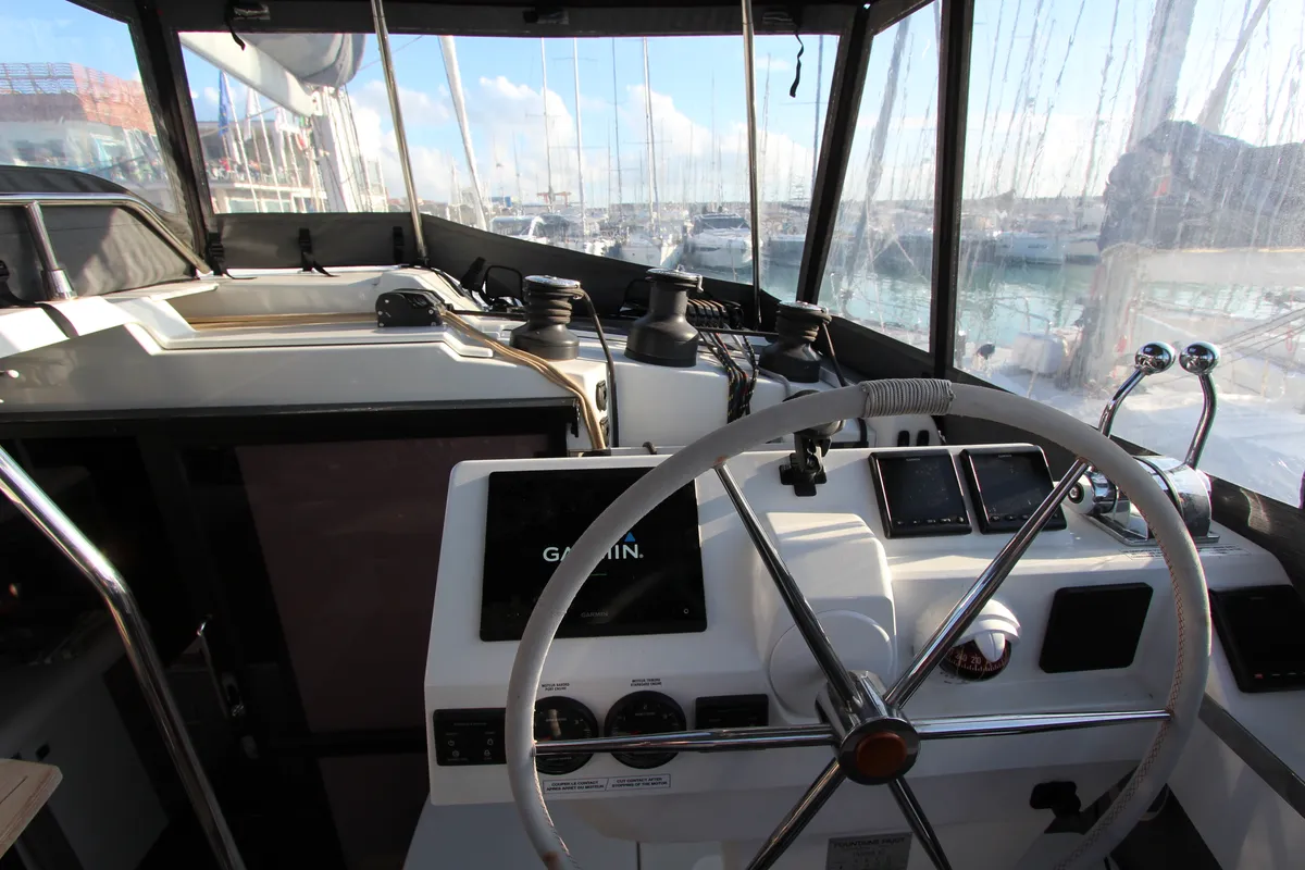 Cockpit of Sonrisa, a Fountaine Pajot Tanna 47 Maestro catamaran at Olbia, Italy