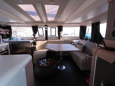 Salon of Sonrisa, a Fountaine Pajot Tanna 47 Maestro catamaran at Olbia, Italy