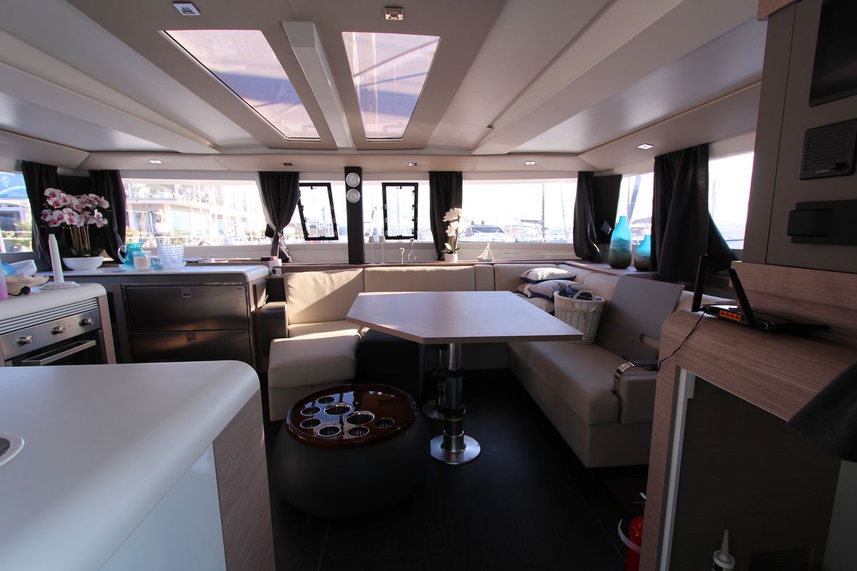 Salon of Sonrisa, a Fountaine Pajot Tanna 47 Maestro catamaran at Olbia, Italy