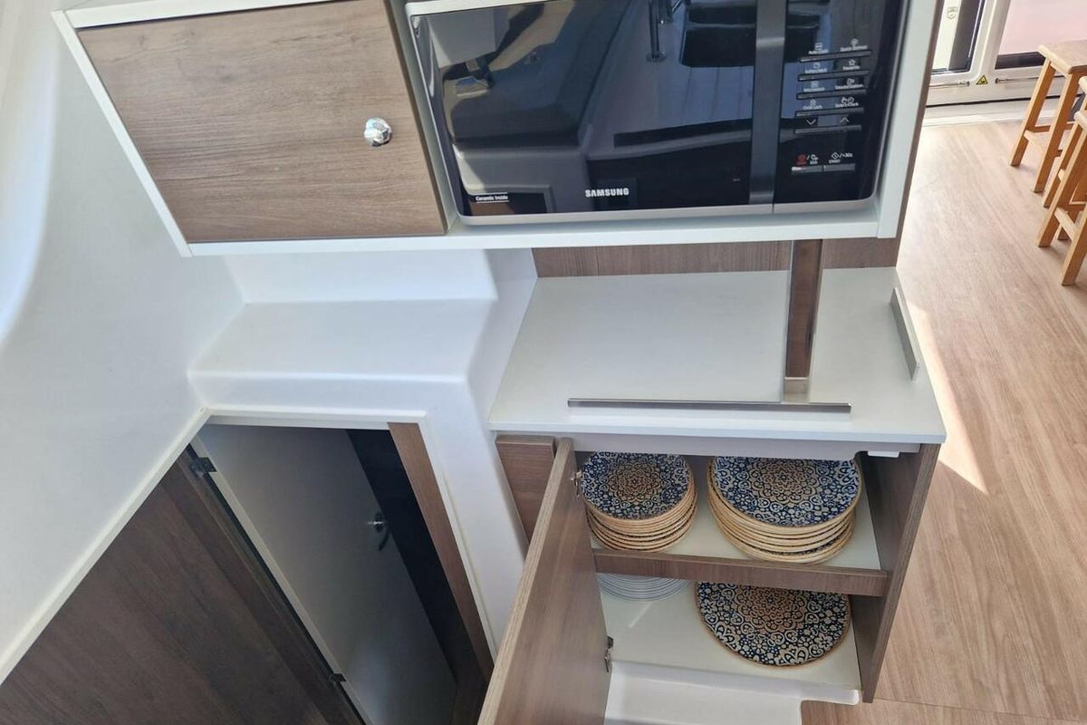 Galley of Turandot, a Bali Catspace catamaran at Sant Antoni de Portmany, Spain