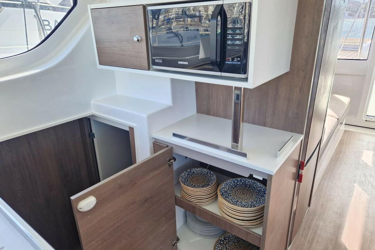Galley of Turandot, a Bali Catspace catamaran at Sant Antoni de Portmany, Spain