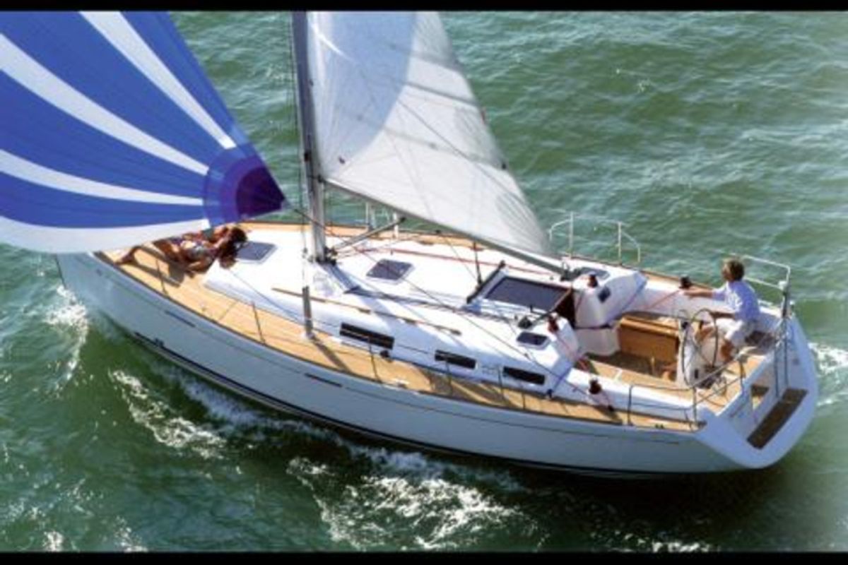Exterior view of Mentholad, a Dufour 365 Grand Large sailboat at Sant Antoni de Portmany, Spain