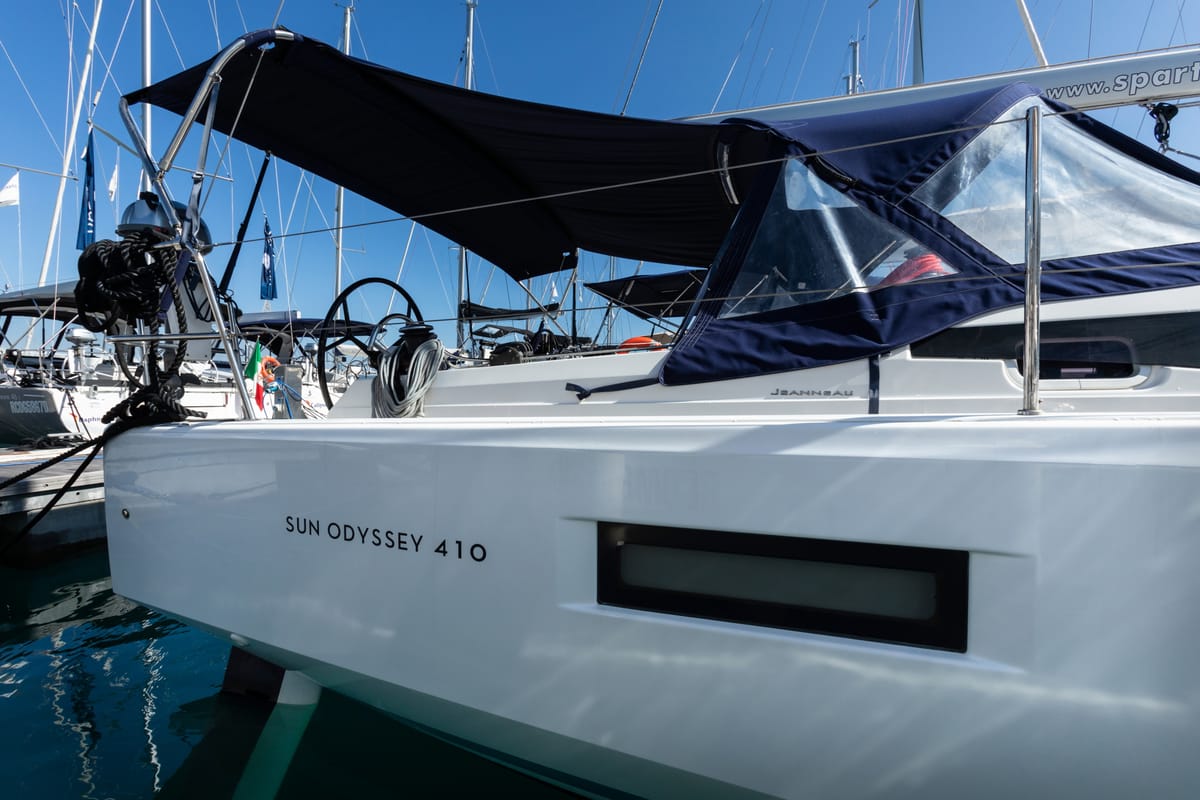 Exterior view of Eumephe - Standard Line, a Jeanneau Sun Odyssey 410 sailboat at Olbia, Italy
