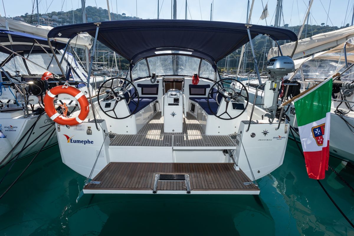Exterior view of Eumephe - Standard Line, a Jeanneau Sun Odyssey 410 sailboat at Olbia, Italy