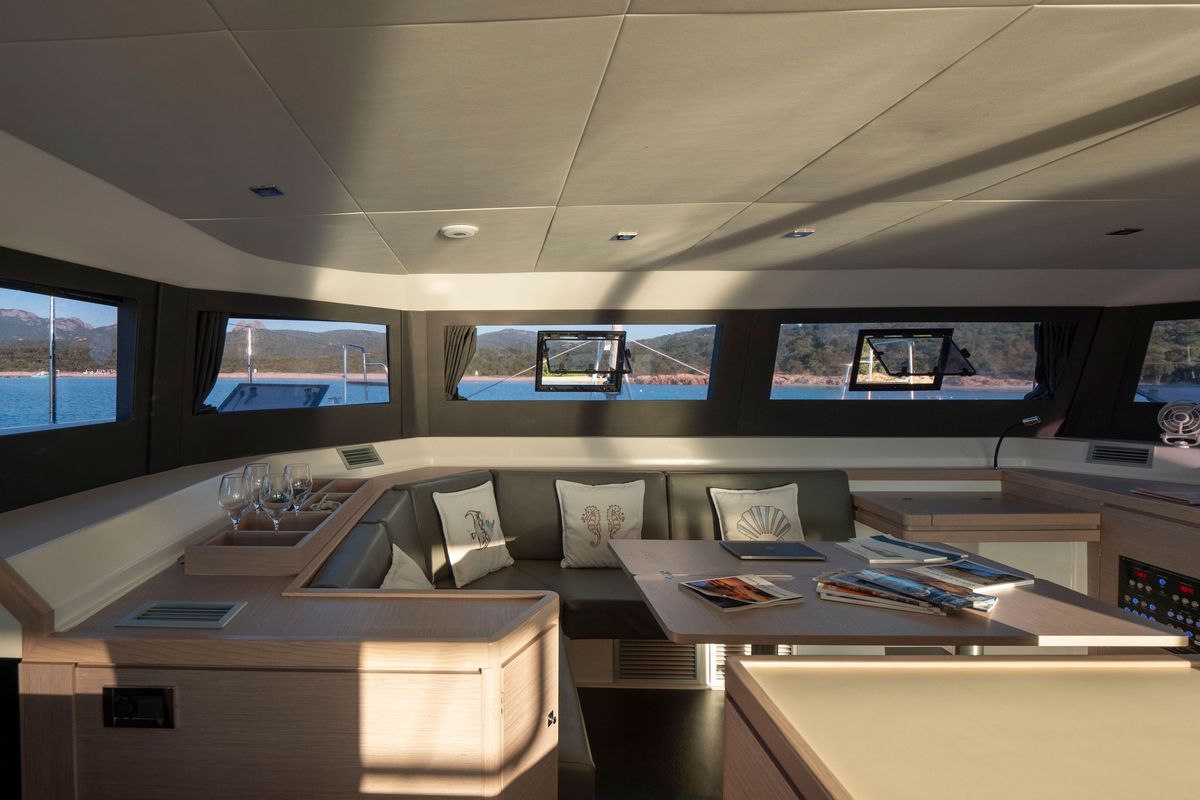Salon of Delphinus, a Dufour 48 Catamaran catamaran at Olbia, Italy