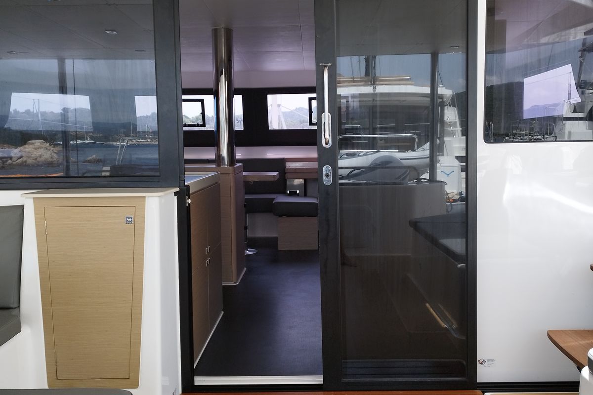 Salon of Delphinus, a Dufour 48 Catamaran catamaran at Olbia, Italy