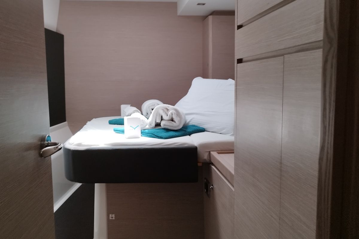 Cabin on Delphinus, a Dufour 48 Catamaran catamaran at Olbia, Italy