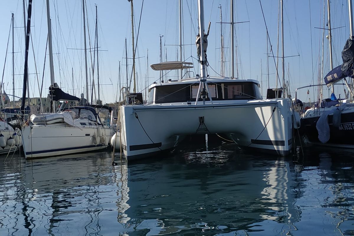Exterior view of Margarita, a Fountaine Pajot Lucia 40 catamaran at Procida, Italy