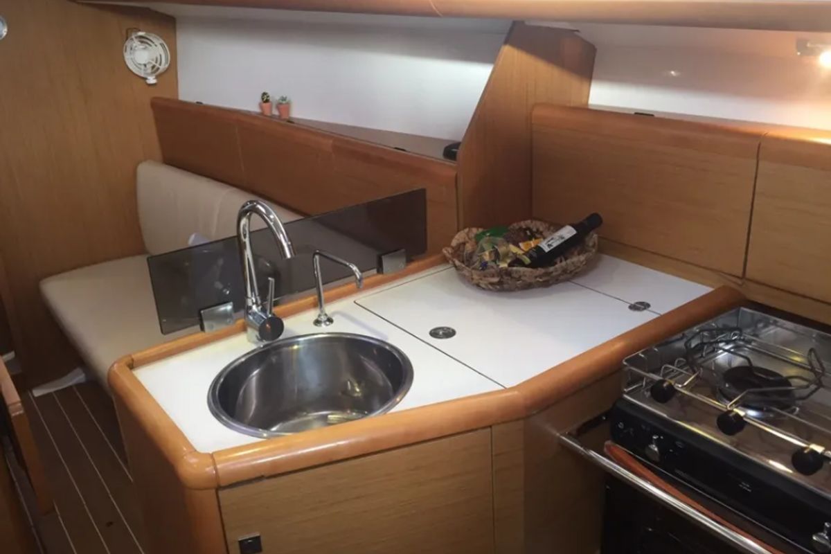 Galley of Carry On, a Jeanneau Sun Odyssey 33i sailboat at Kontokali, Greece