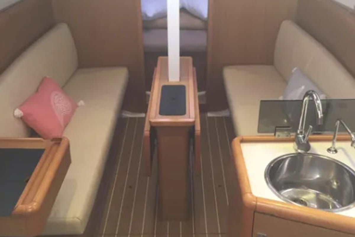 Salon of Carry On, a Jeanneau Sun Odyssey 33i sailboat at Kontokali, Greece