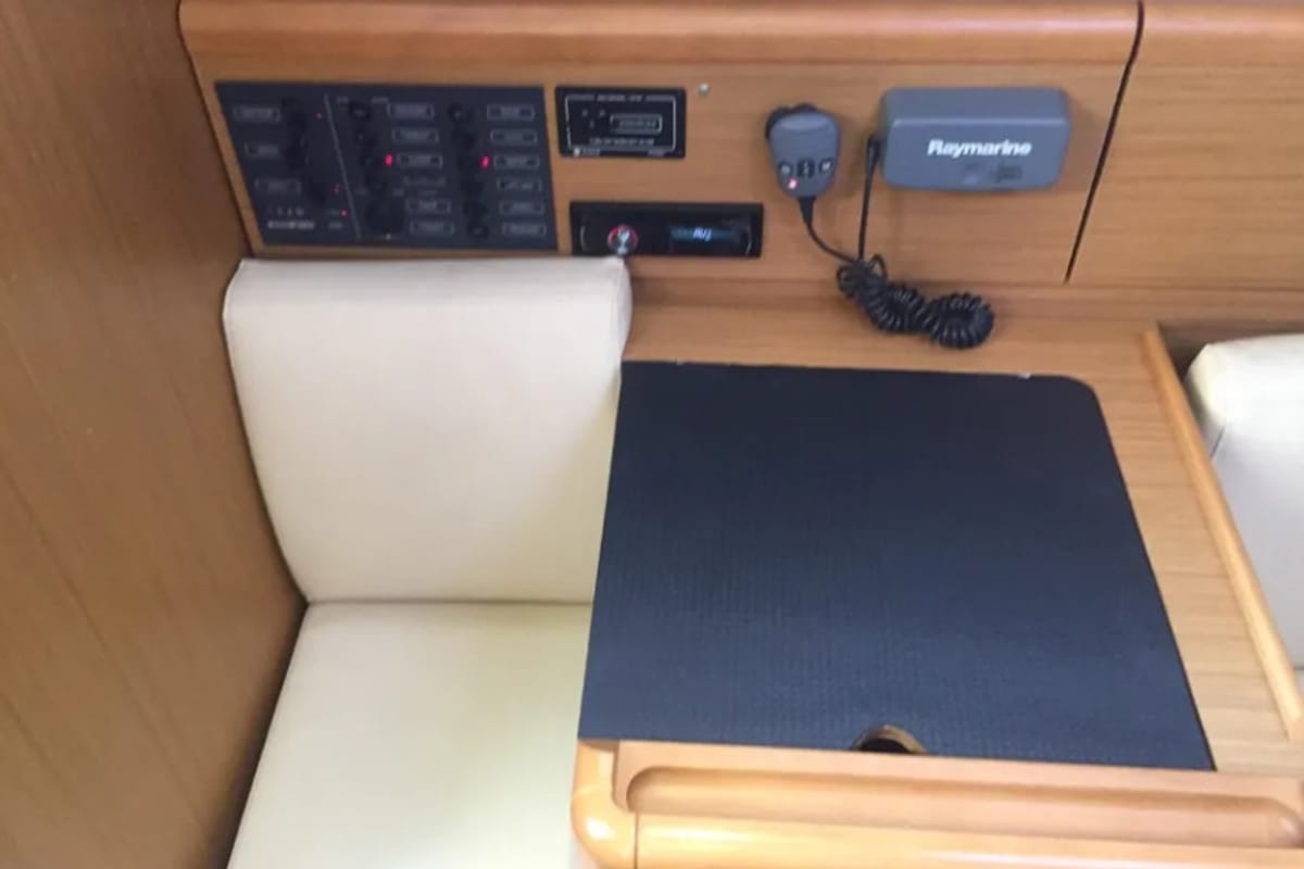 Salon of Carry On, a Jeanneau Sun Odyssey 33i sailboat at Kontokali, Greece
