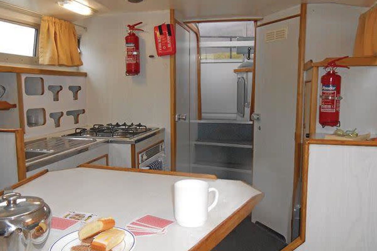 Galley of Kingfisher WHS - Budget 1, a Cygnet Kingfisher WHS motorboat at Laggan, United Kingdom