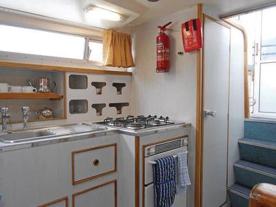 Galley of Kingfisher WHS - Budget 1, a Cygnet Kingfisher WHS motorboat at Laggan, United Kingdom