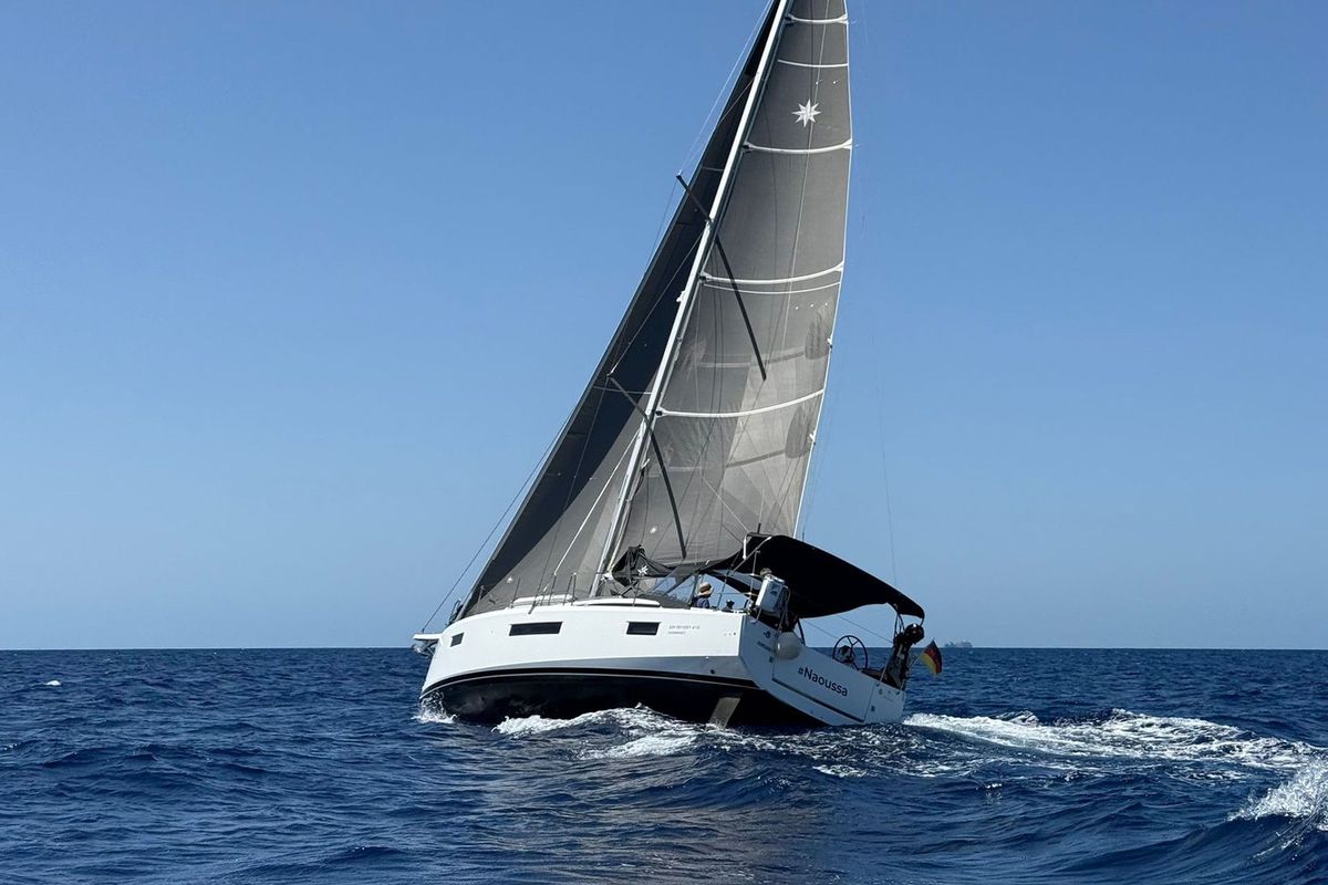 Exterior view of Naoussa, a Jeanneau Sun Odyssey 410 sailboat at Palma de Mallorca, Spain